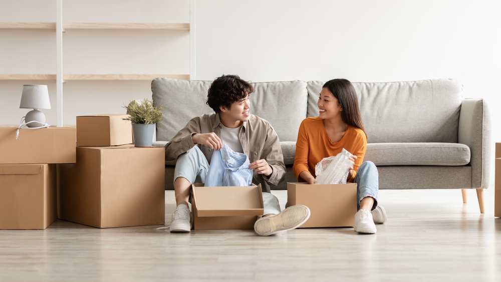 Relocation,Day,Concept.,Cheerful,Millennial,Asian,Couple,Unpacking,Belongings,And